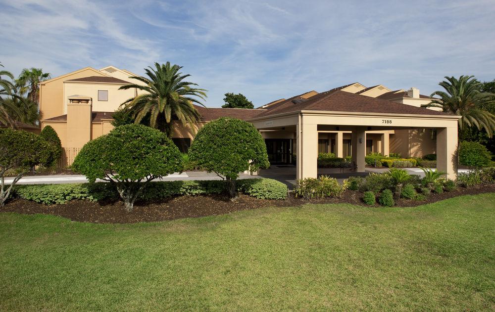 Отель Courtyard By Marriott Orlando Airport Экстерьер фото